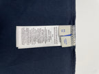 Inside neck size label marked XS on navy T-shirt
