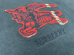 Navy T-shirt with red horse graphic and dark BURBERRY lettering