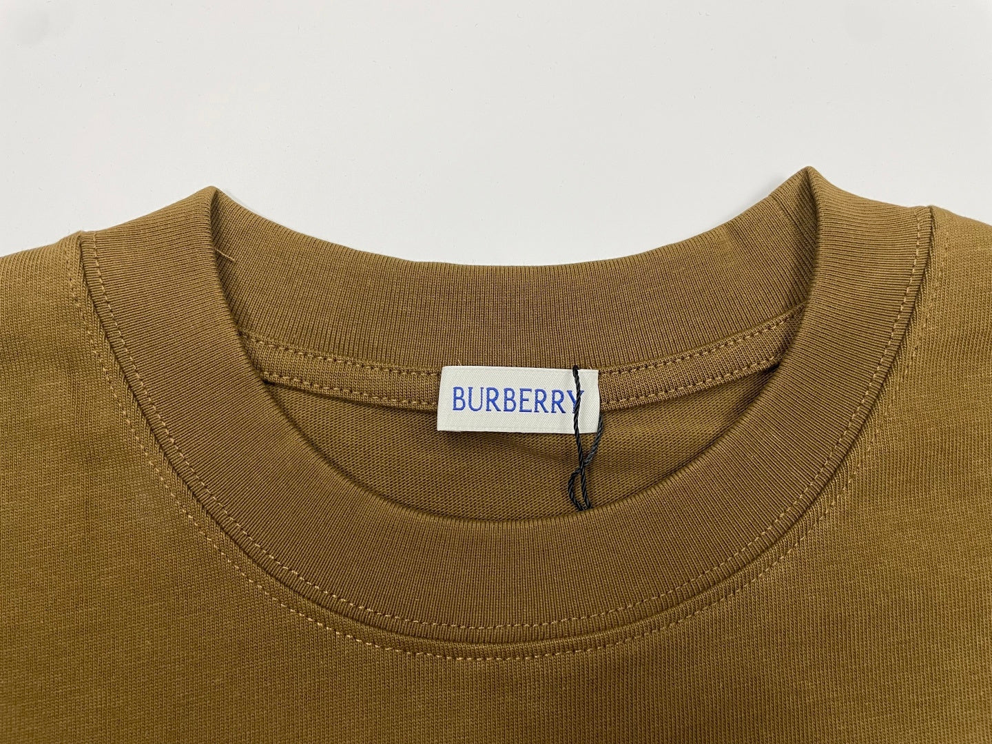 Brown Burberry crew-neck T-shirt with brand label at neckline