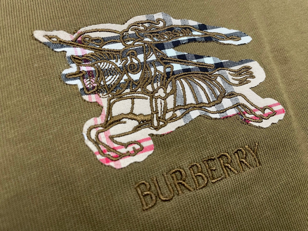 Brown Burberry T-shirt with embroidered horse-and-helmet graphic and 'BURBERRY'