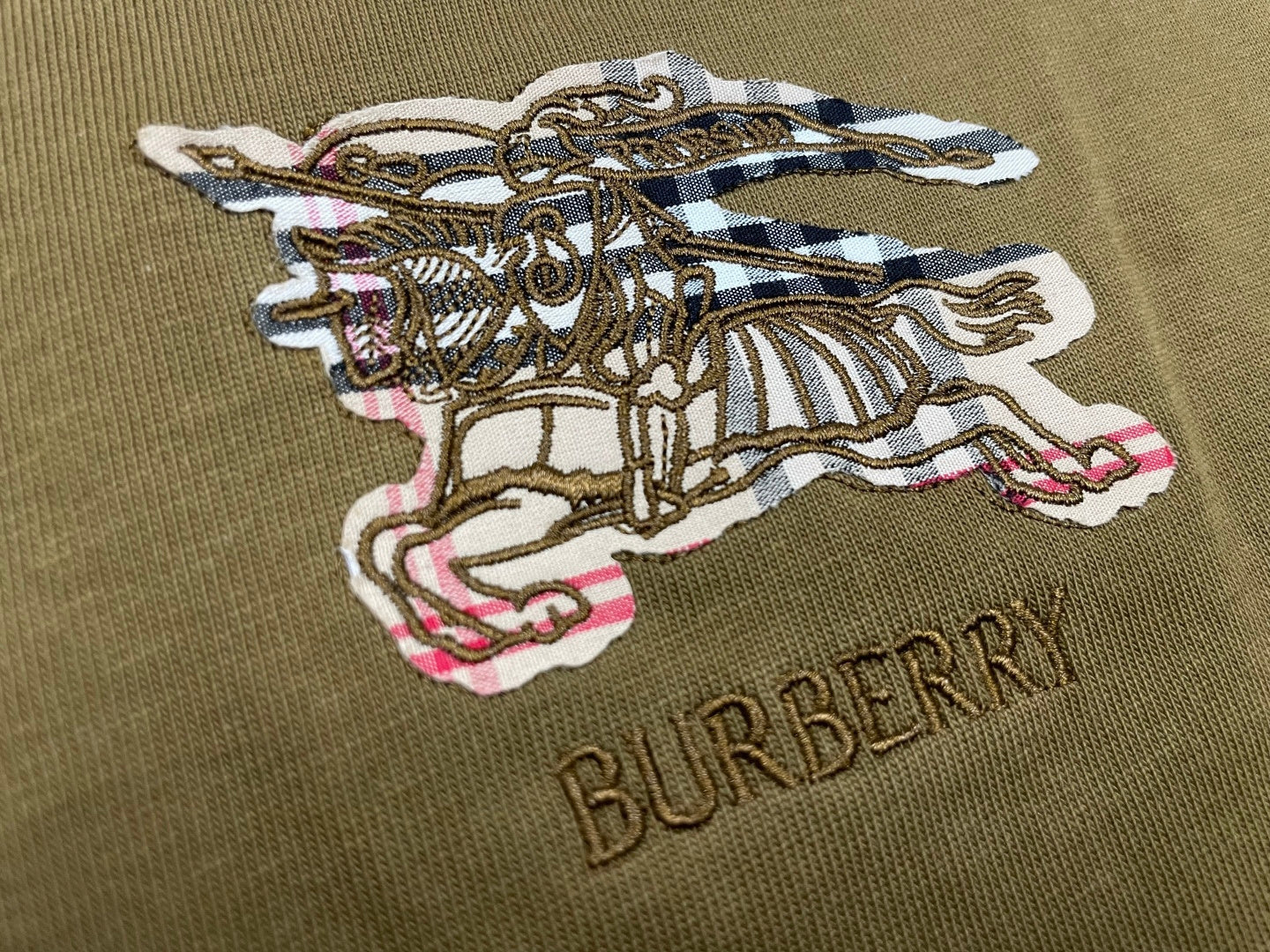 Brown Burberry T-shirt with embroidered horse-and-helmet graphic and 'BURBERRY'