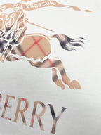 Close-up of horse graphic and Burberry text on white T-shirt