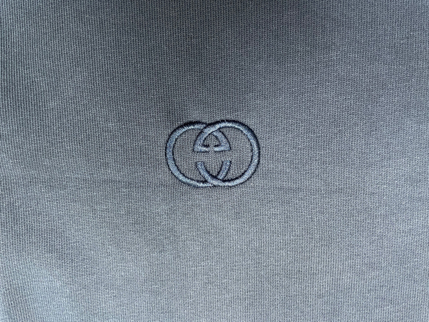Navy T-shirt with small embroidered logo on chest