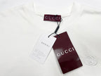 White crewneck T-shirt with Gucci hang tags attached
