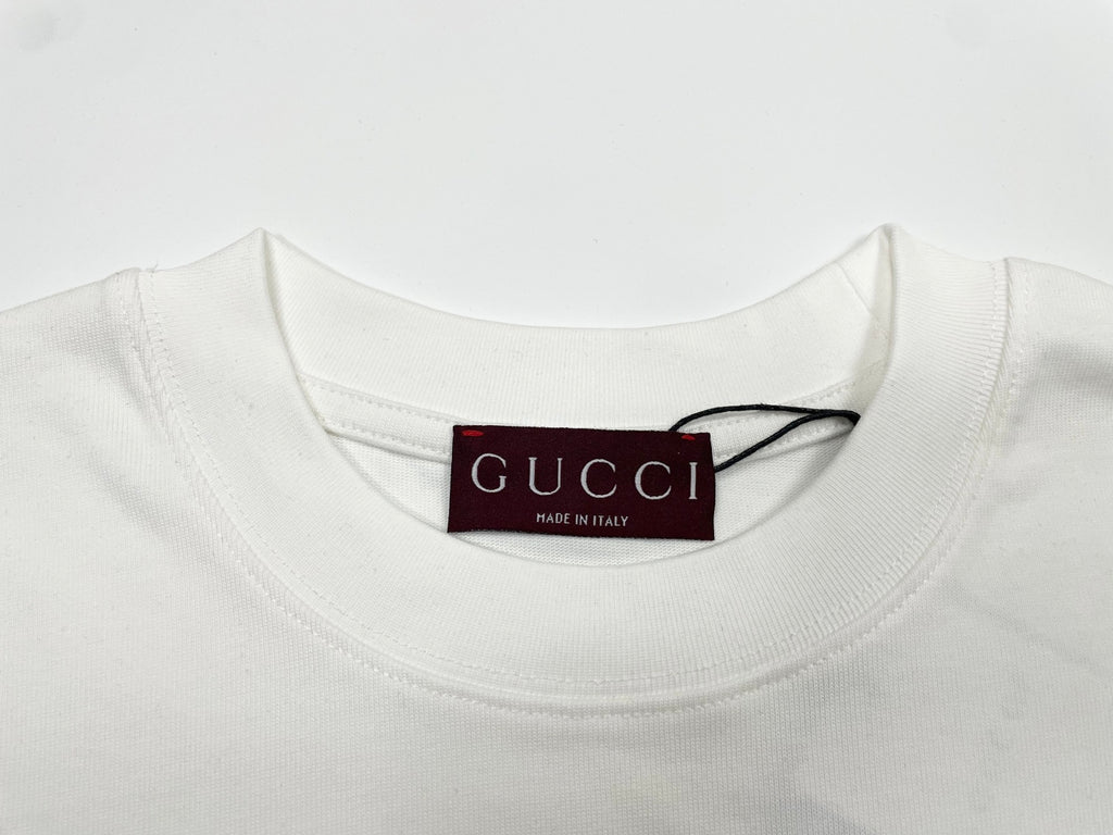 White crewneck T-shirt neckline with Gucci brand and size tag