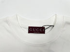White crewneck T-shirt neckline with Gucci brand and size tag