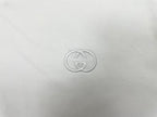 Gucci-style logo embroidery on white T-shirt fabric
