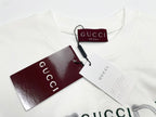 White T-shirt with Gucci neck label and attached product tags