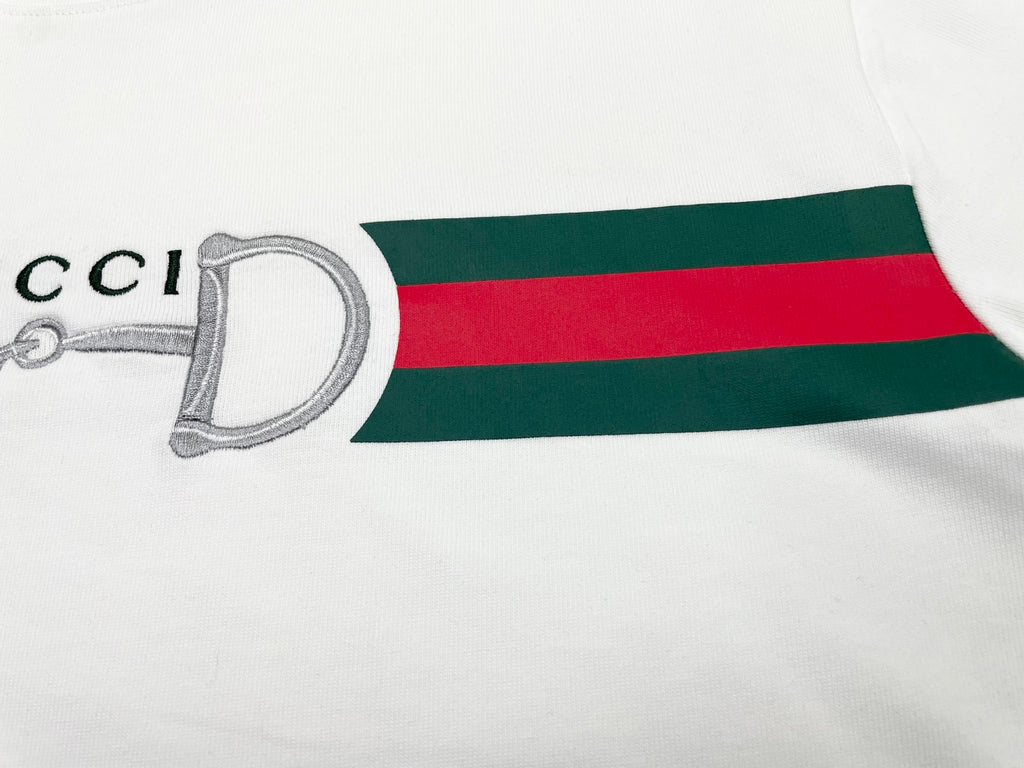 White T-shirt with green and red stripe band and horsebit graphic detail