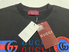 Dark Gucci T-shirt neckline with GUCCI size tag and paper labels