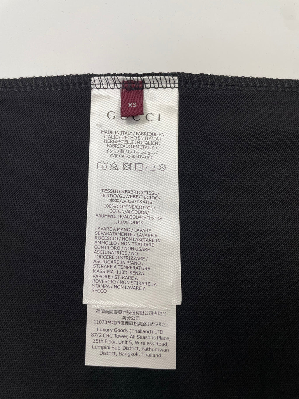 Gucci T-shirt inner size and care label at collar