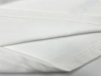 White T-shirt fabric fold with stitched hem edge