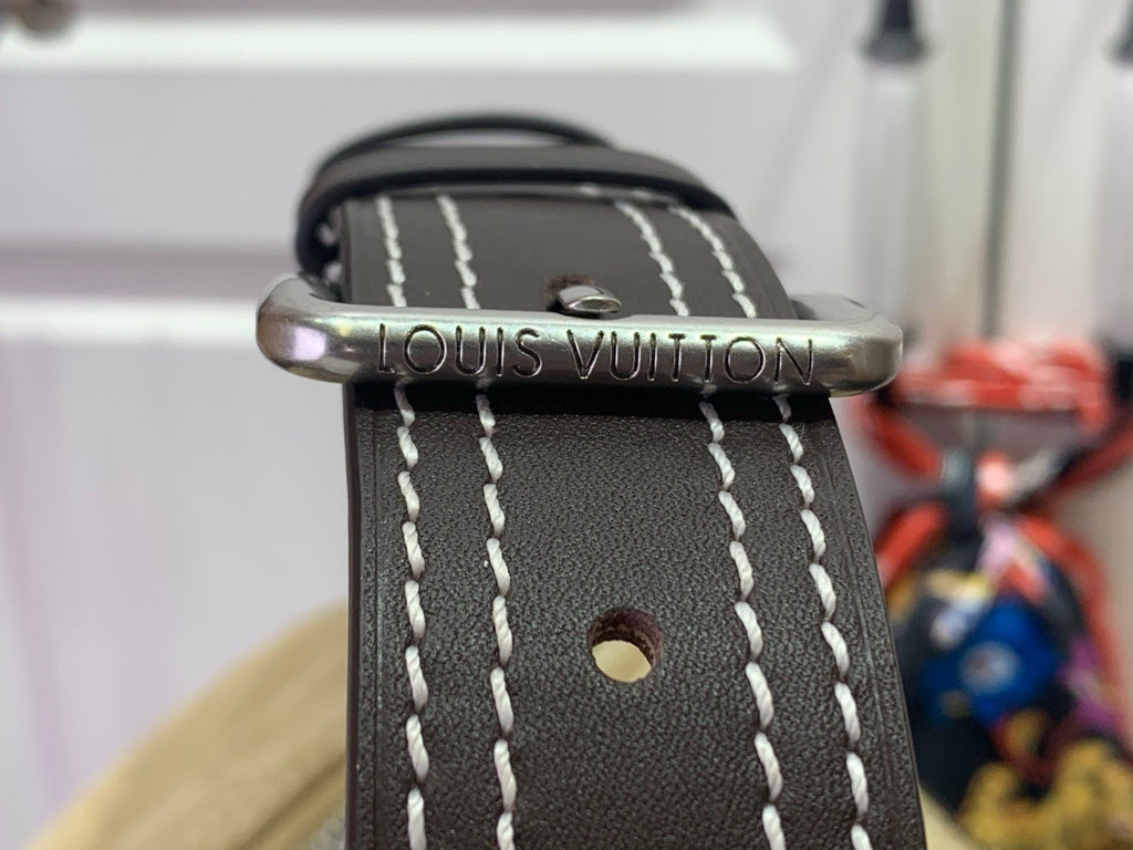Louis Vuitton bag strap with metal buckle and white contrast stitching