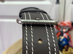 Louis Vuitton bag strap with metal buckle and white contrast stitching