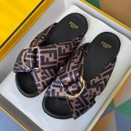 Fendi sandals with FF-pattern fabric straps, black footbeds, gold buckle ornament