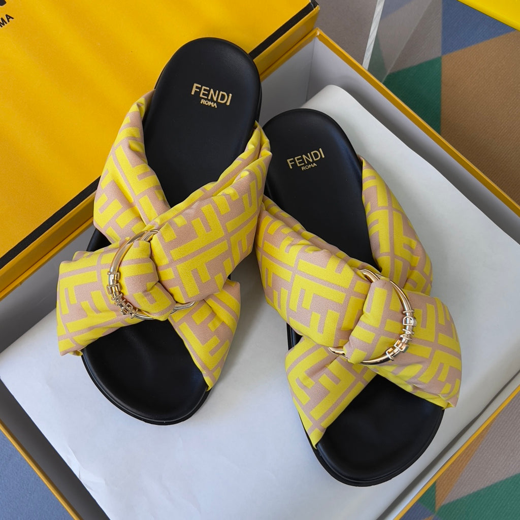 Fendi yellow logo slide sandals with bow strap, gold-tone chain buckles, black insoles