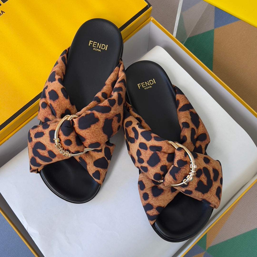 Fendi leopard-print sandals in box with black footbeds and gold ring hardware
