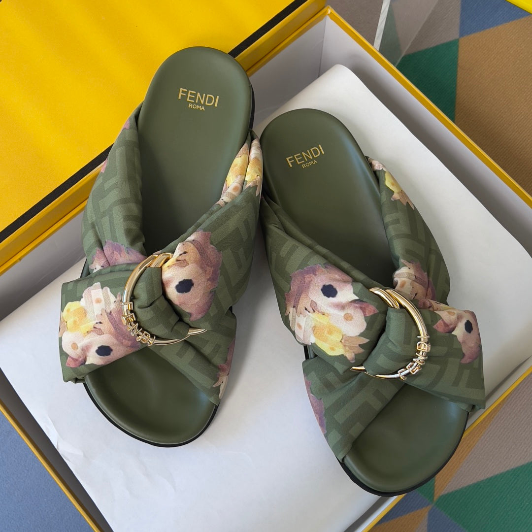 Pair of olive Fendi slide sandals with FF straps, floral bows and gold hardware
