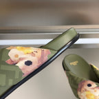 Olive Fendi slide sandal with floral strap overlay and gold ring hardware