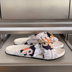 Fendi sandals, white slides with floral Fendi FF print and gold buckle detail