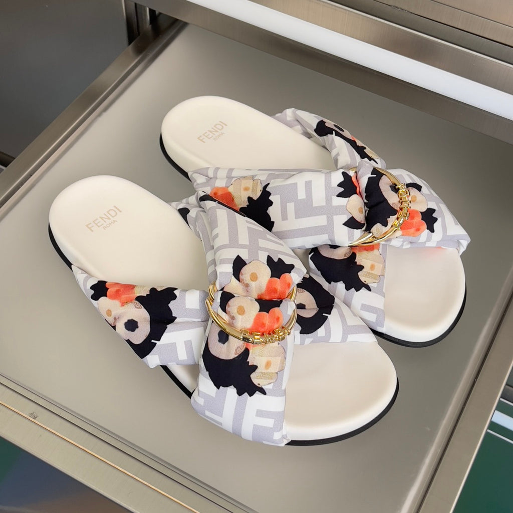 Fendi sandals, white footbeds with floral Fendi FF straps and gold buckle ornament