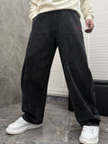 Wide-leg denim pants, dark wash, elastic drawstring waist and roomy straight legs.