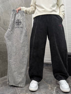Wide-leg denim pants set: one black and one washed gray, both with elastic drawstring waist.