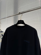 Balenciaga black crewneck long-sleeve sweatshirt front chest logo