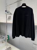 Balenciaga black crewneck long-sleeve sweatshirt on hanger