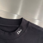 Black Dior crew-neck long-sleeve shirt collar with Dior logo near shoulder