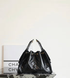Chanel quilted leather hobo bag in dark tone with dual chain handles