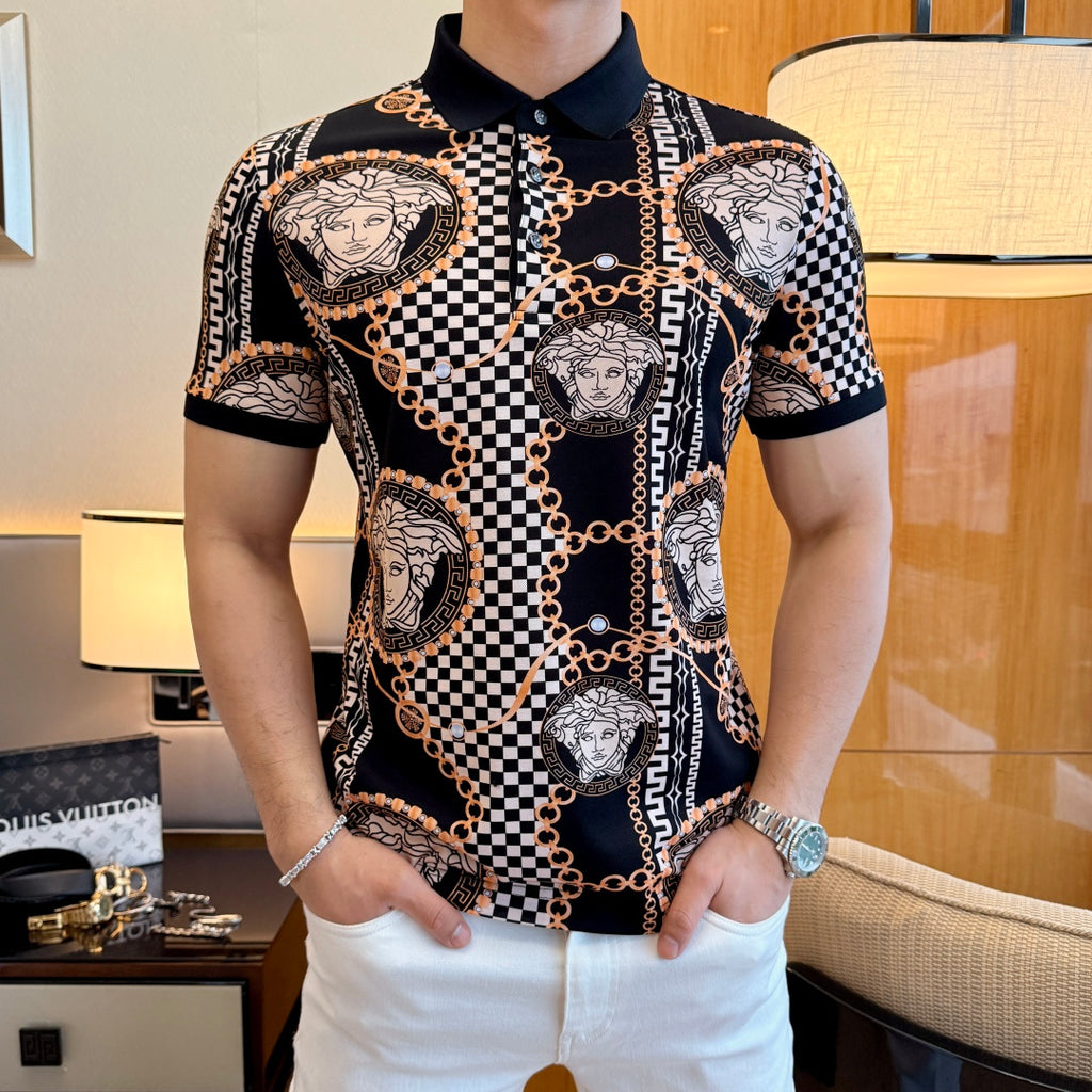 Black short-sleeve polo shirt with Medusa portrait print, checkered panels, and gold chain details.