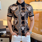 Black short-sleeve polo shirt with Medusa portrait print, checkered panels, and gold chain details.