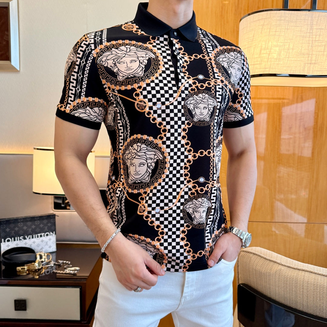 Black short-sleeve polo shirt with Medusa portrait motif, checkered panels, and gold chain print.