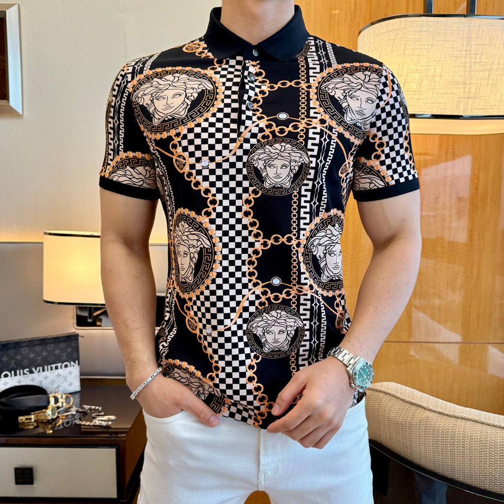 Black short-sleeve polo shirt with Medusa portraits, checkered center stripe, and gold chain links.