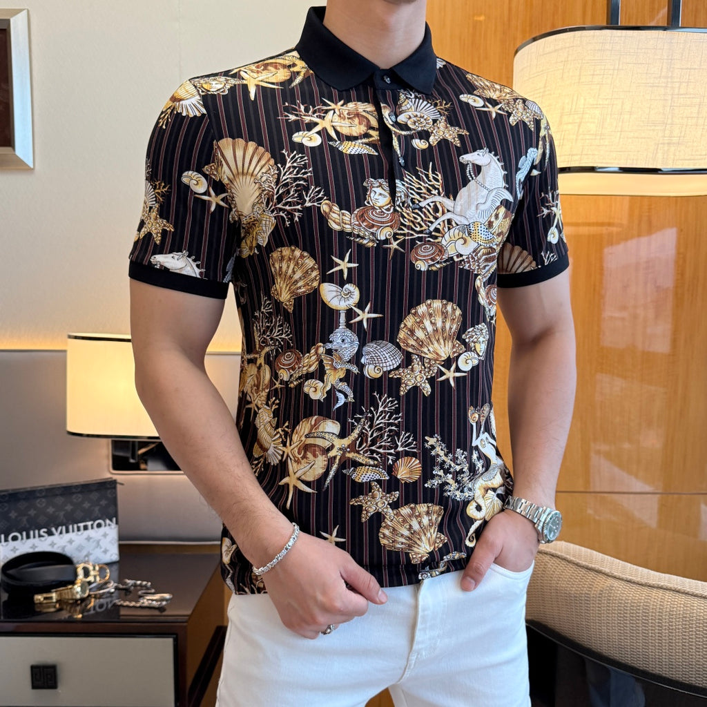 Short-sleeve polo shirt with black collar and colorful marine artwork on dark stripes