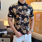 Short-sleeve polo shirt with black collar and colorful marine artwork on dark stripes