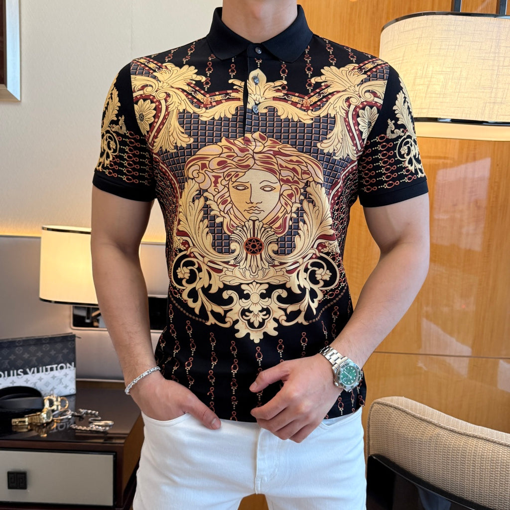 Polo shirt with ornate gold-red face graphic on black fabric, button collar and short sleeves