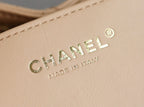 Chanel logo on beige leather, with 'MADE IN ITALY' text below.