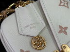 Louis Vuitton bag with light patterned leather and gold clasp, monogram flower patch