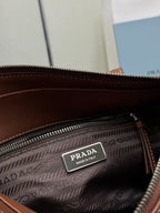 Brown Prada interior zip pouch with Prada "Made in Italy" label