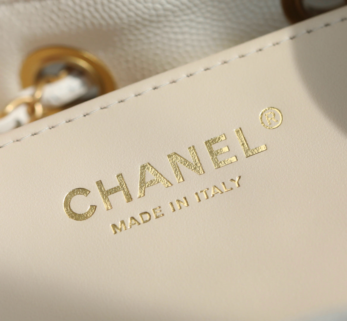 Chanel leather stamp: CHANEL MADE IN ITALY, gold lettering close-up