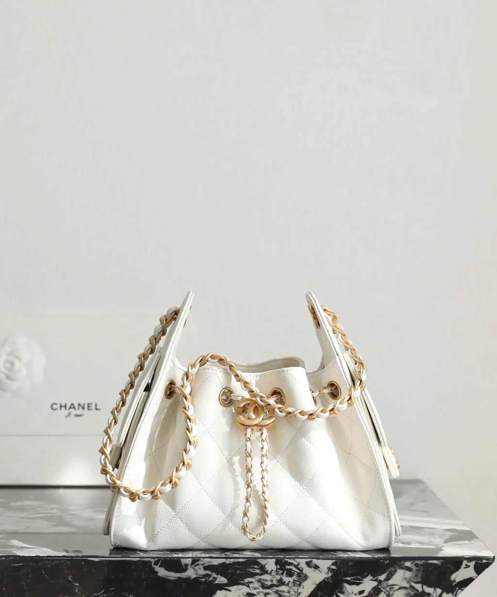 Chanel white quilted handbag with gold chain straps and curved top handle