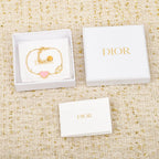 Heart charm bracelet in Dior gift box with heart charm bracelet inside