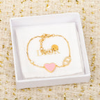Dior heart charm bracelet in white gift box, pink heart pendant and gold chain