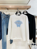 White crewneck sweatshirt with blue Versace Medusa logo print on chest.