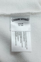 White hoodie size label inside garment with MEDIUM and care information