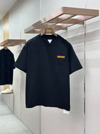 Navy crewneck pocket T-shirt with short sleeves and small front chest logo label