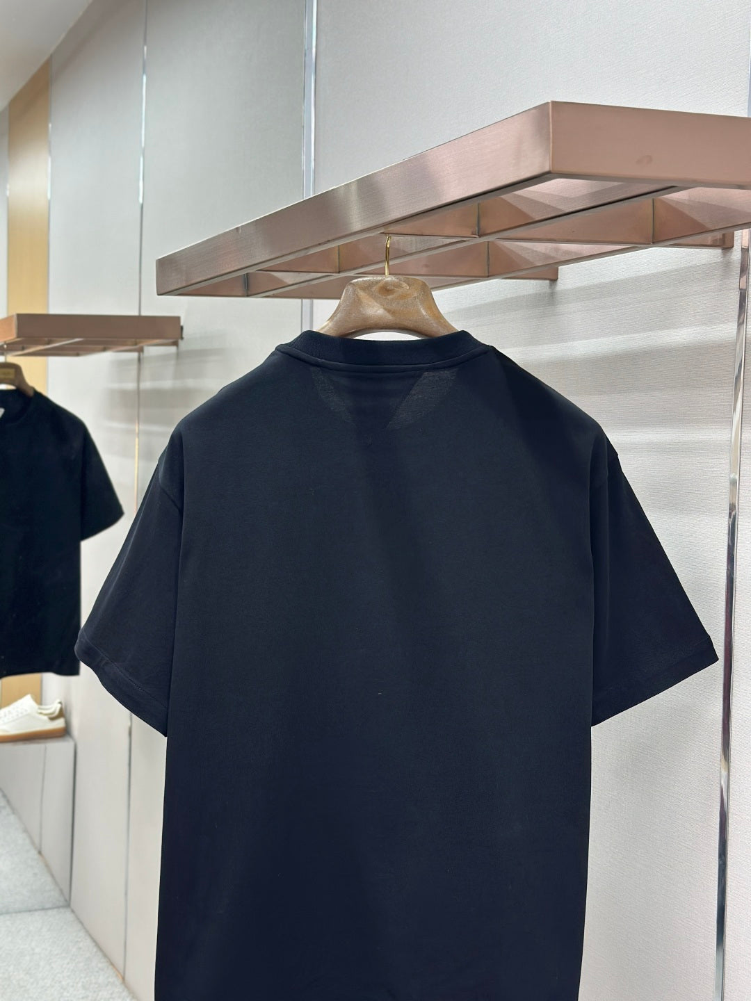 Navy crewneck short-sleeve T-shirt, back view