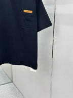Navy crewneck T-shirt with front pocket and short sleeves